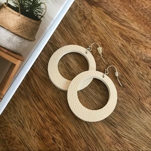 White Leather hoop earrings.